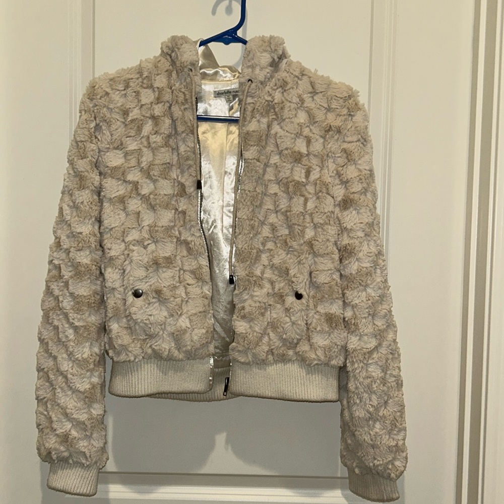 A cute soft jacket. Silky on the inside.
